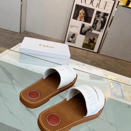 WOODY MULE IN WHITE LAMBSKIN WITH EMBROIDERED LOGO