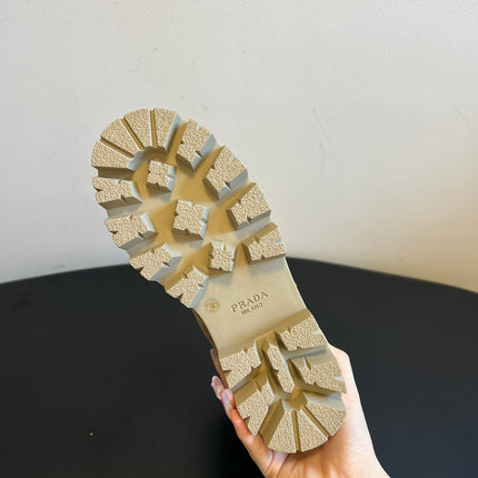 PRADA 25S PLATFORM ANKLE BOOTS IN BEIGE SUEDE WITH GOLD HARDWARE