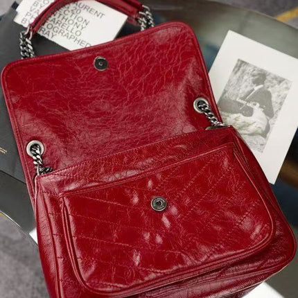 YSL MEDIUM NIKI BAG IN RED GLOSSY CALFSKIN AND HARDWARE