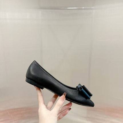 YSL 26S POINTED TOE BOW PUMPS IN BLACK CALFSKIN