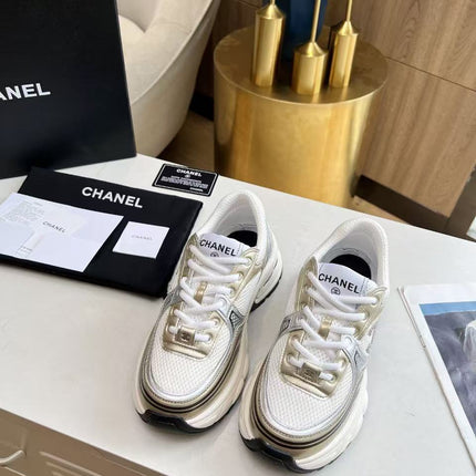 CHANEL RUNNER SNEAKERS IN GOLD LAMINATE COLORWAY MESH