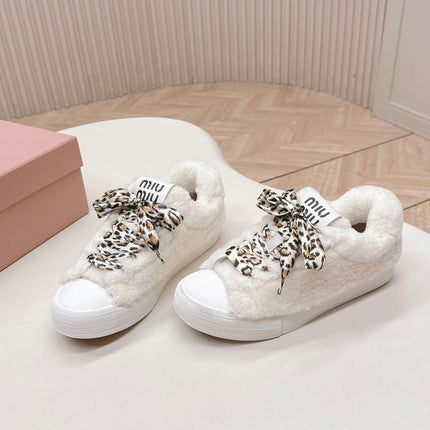 MIUMIU 25S SNEAKERS IN WHITE SHEARLING WITH LEOPARD-PRINT LACES