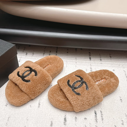 CHANEL 26S SLIDE MULES IN BROWN SHEARLING AND BLACK CC LOGO