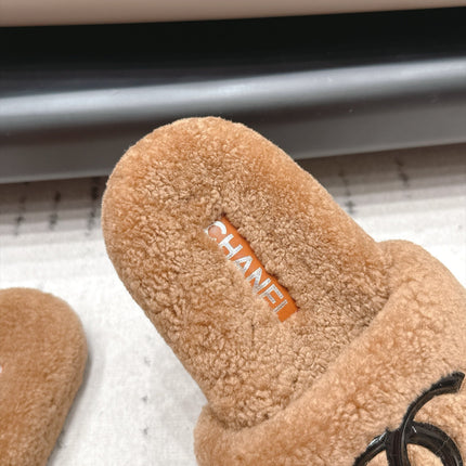 CHANEL 26S SLIDE MULES IN BROWN SHEARLING AND BLACK CC LOGO