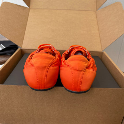 PRADA 25S SNEAKER IN ORANGE SILK