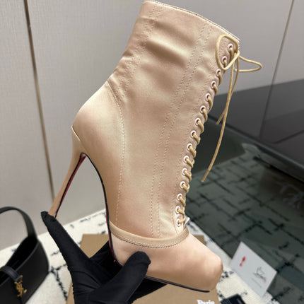 CHRISTIAN LOUBOUTIN 26S LACE-UP HEEL BOOTS 100 MM IN BEIGE SATIN
