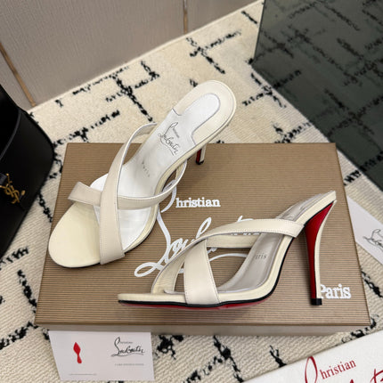 CHRISTIAN LOUBOUTIN 26S CROSS-STRAP HIGH HEEL SANDALS 105 MM IN CREAM WHITE CALFSKIN
