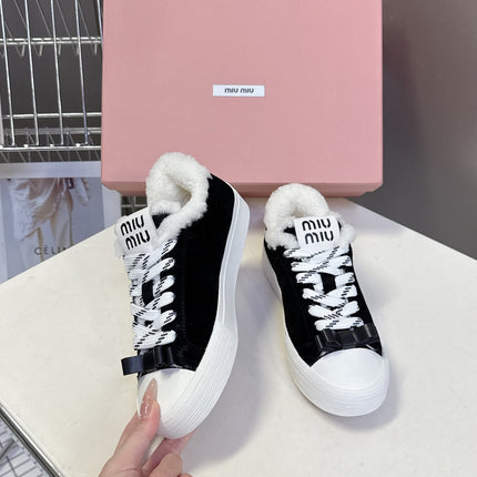 MIUMIU 25S SNEAKERS IN BLACK SUEDE WITH SHEARLING