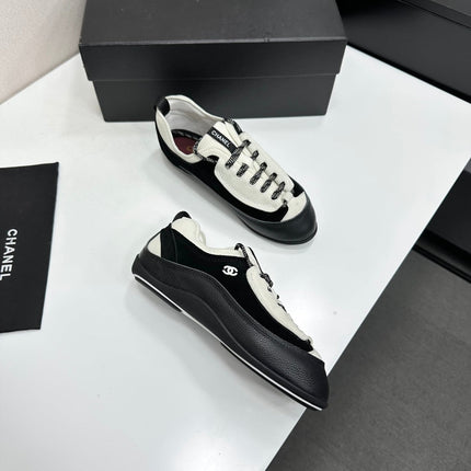 CHANEL SNEAKERS METIERS D-ART 26S IN  BLACK AND WHITE CALFSKIN MIXED FIBERS