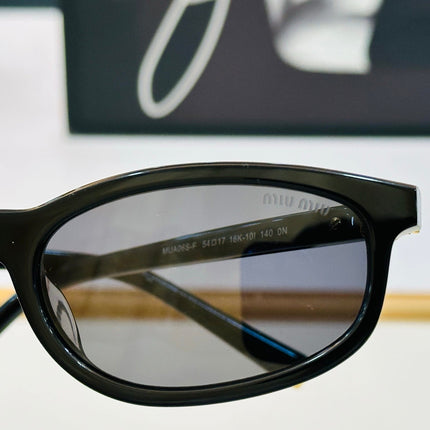 MIU SUNGLASSES IN RECTANGULAR ACETATE 646116