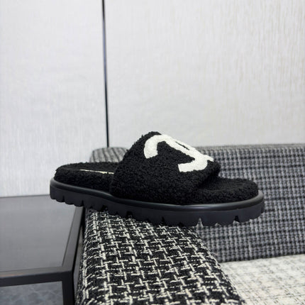 CHANEL 26S SLIDE SANDALS  IN BLACK AND WHITE SHEARLING OPEN TOE