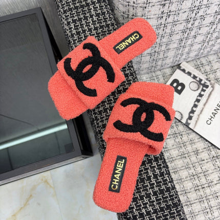 CHANEL 26S SLIDE SANDALS IN BLACK AND CORAL PINK SHEARLING SQUARE TOE