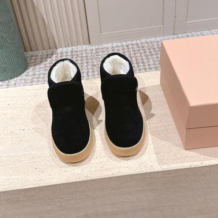 MIUMIU 25S SLIP-ON BOOTIES IN BLACK SUEDE WITH FAUX SHEARLING
