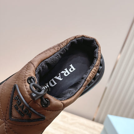 PRADA 26S QUILTED DRAWCORD MULE SHOES 30MM IN DARK BROWN NYLON