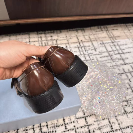 PRADA 26S BUCKLED LOAFERS IN DARK BROWN SHINY CALFSKIN