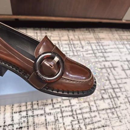 PRADA 26S BUCKLED LOAFERS IN DARK BROWN SHINY CALFSKIN