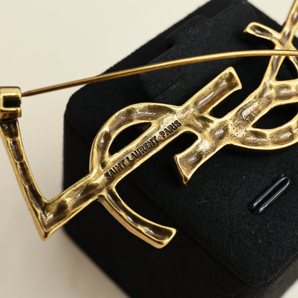 YSL 26S BAMBOO TEXTURED MONOGRAM BROOCH IN GOLD TONE METAL