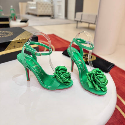 CHRISTIAN LOUBOUTIN 26S FLOWER-EMBELLISHED SANDALS 100 MM IN GREEN SATIN