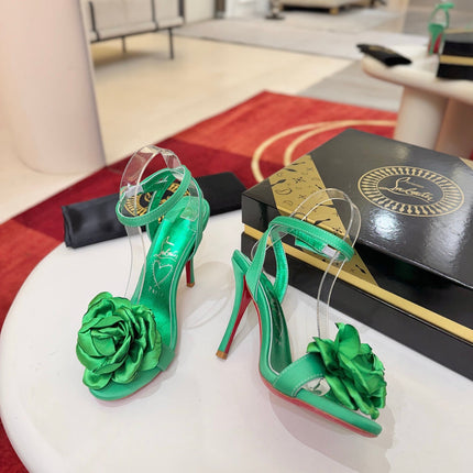 CHRISTIAN LOUBOUTIN 26S FLOWER-EMBELLISHED SANDALS 100 MM IN GREEN SATIN