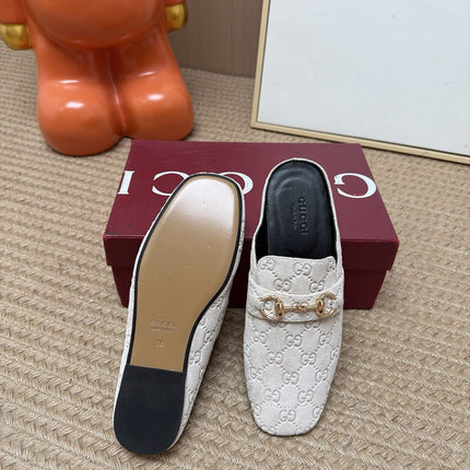 GUCCI 26S FLAT MULES IN OFF WHITE GG EMBOSSED SUEDE