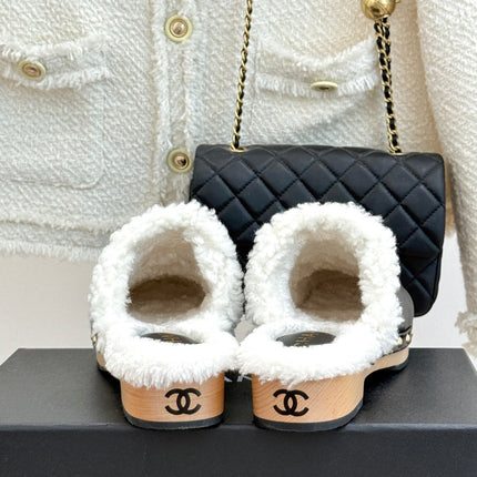 CHANEL 26S SHEARLING LINED CLOG MULES IN BLACK CALFSKIN AND SUEDE