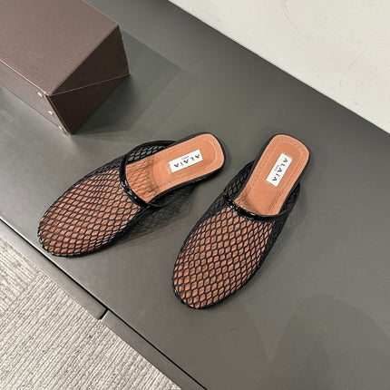 ALAIA FLAT MULES IN BLACK MESH FISHNET