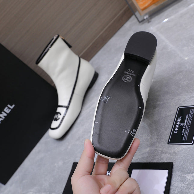 CHANEL 26S ANKLE BOOTS IN WHITE CALFSKIN WITH BLACK PATENT LEATHER TRIM AND CC LOGO ON TOE CAP