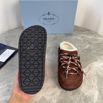 PRADA 26S WOVEN MULES IN DARK BROWN SUEDE
