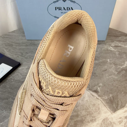 PRADA 26S GEAR SOLE SNEAKERS IN BEIGE SUEDE AND MESH