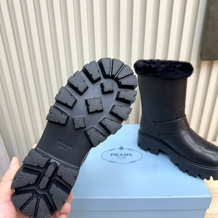PRADA 25S MARTIN BOOTS IN BLACK CALFSKIN FUR-LINED
