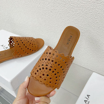 ALAIA VIENNE FLAT MULES IN CHOCOLATE BROWN LAMBSKIN