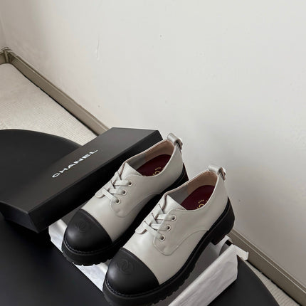 CHANEL 26S LACE UP PLATFORM IN BLACK AND GREY CALFSKIN