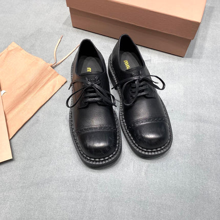 MIUMIU 26S LACE-UP LOAFERS IN BLACK GRAINED CALFSKIN