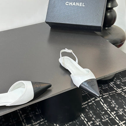 CHANEL 26S POINTED-TOE SLINGBACKS IN WHITE AND BLACK LAMBSKIN