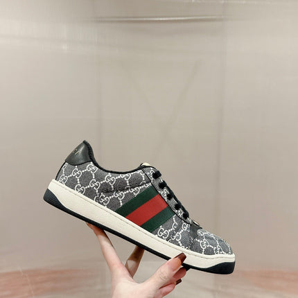 GUCCI 26S SCREENER SNEAKER IN BLACK AND WHITE GG CANVAS