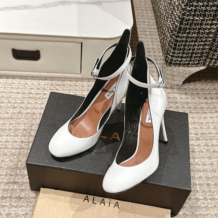 ALAIA ROUND-TOE HIGH HEELS 10 CM IN WHITE CALFSKIN