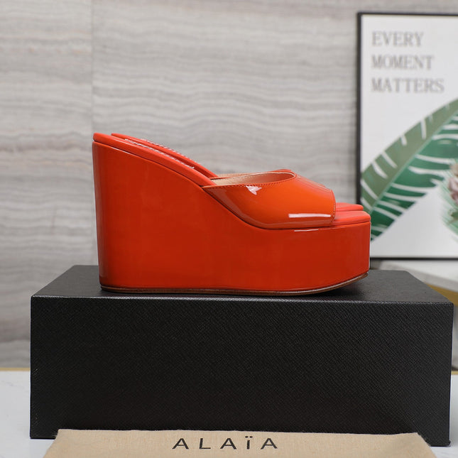 ALAIA PLATFORM WEDGE IN VIVID ORANGE LAMBSKIN WITH RED HEART