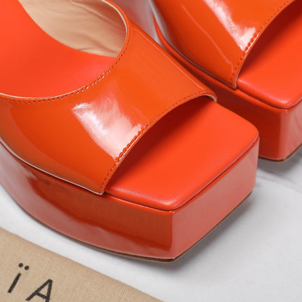 ALAIA PLATFORM WEDGE IN VIVID ORANGE LAMBSKIN WITH RED HEART