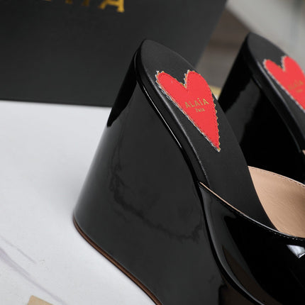 ALAIA PLATFORM WEDGE IN BLACK LAMBSKIN WITH RED HEART
