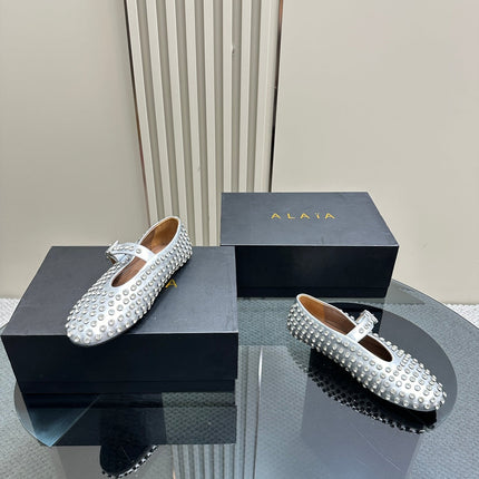 ALAIA CRYSTAL EMBELLISHED BALLET FLATS IN SILVER CALFSKIN