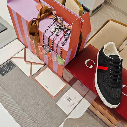 GUCCI 26S GG WEB SNEAKERS IN BLACK GG CANVAS