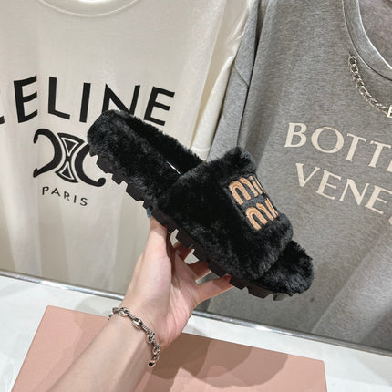 MIUMIU 26S FLAT SLIDES IN BLACK SHEARLING