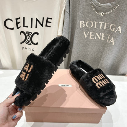 MIUMIU 26S FLAT SLIDES IN BLACK SHEARLING
