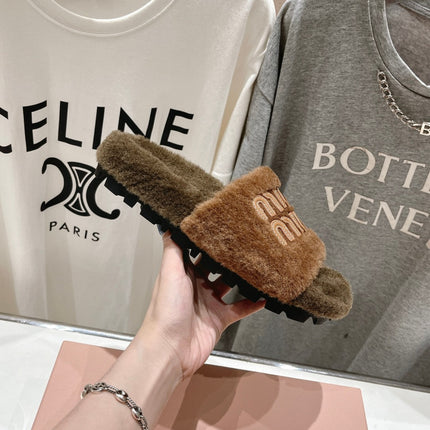 MIUMIU 26S FLAT SLIDES IN BROWN SHEARLING