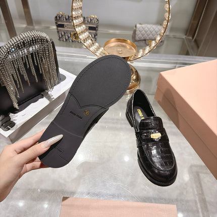 MIUMIU 26S BLOCK HEEL LOAFERS 25MM IN BLACK CROCODILE EMBOSSED CALFSKIN