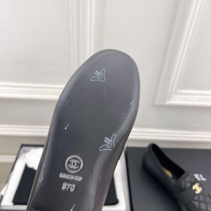 CHANEL 26S LOAFER MULES IN BLACK LAMBSKIN FABRIC